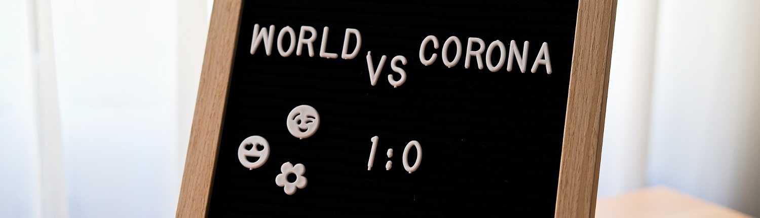 Sign board - World vs Corona 1:0