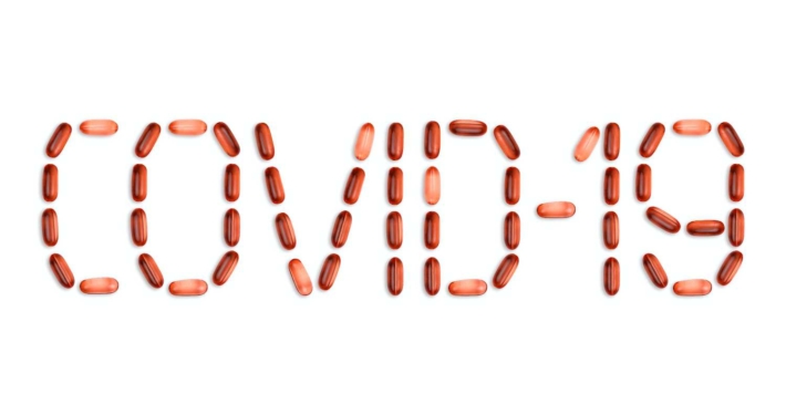 COVID-19 sign made with pills